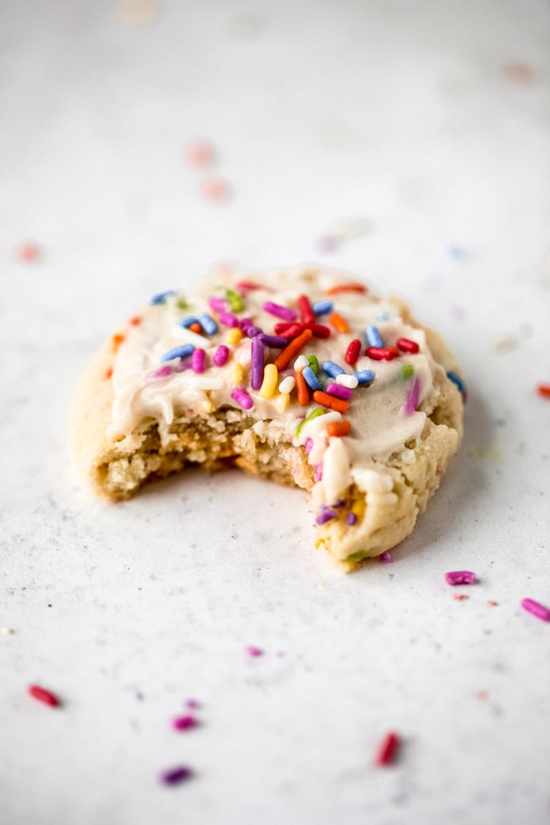 gluten free birthday cake cookie with a bite taken out